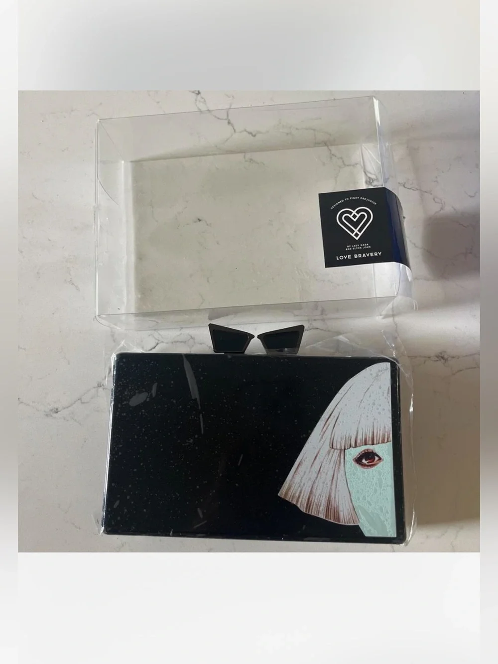 NIB Love Bravery Lady Gaga Elton John Women's Black Graphic Clutch  Face Accent